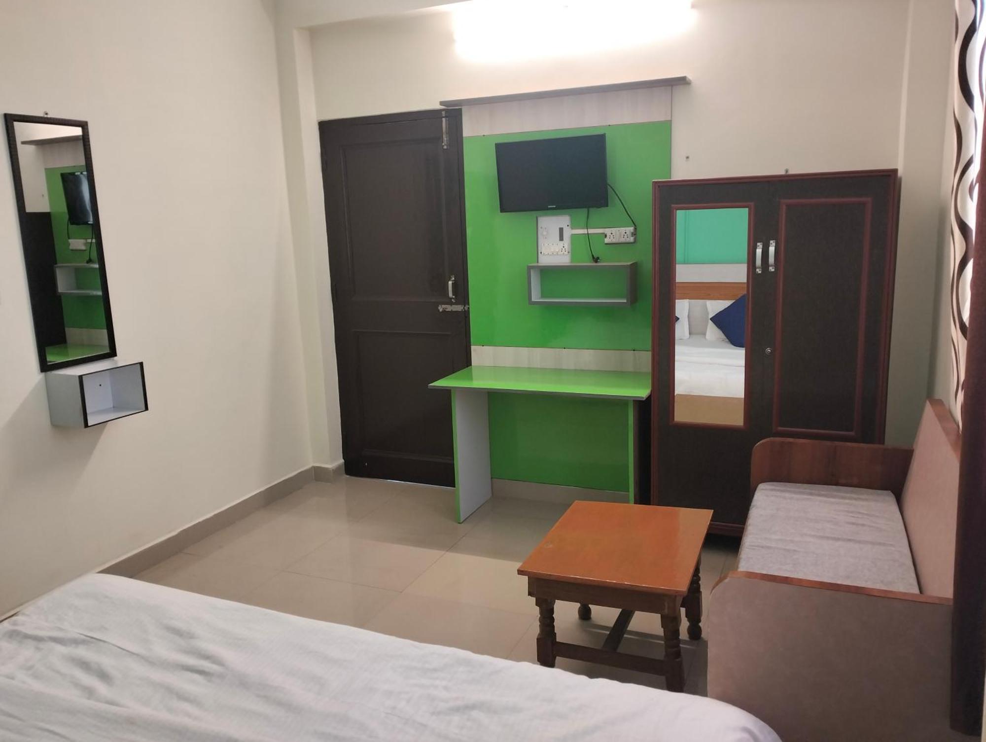 Aman Inn Dharamshala Phòng bức ảnh