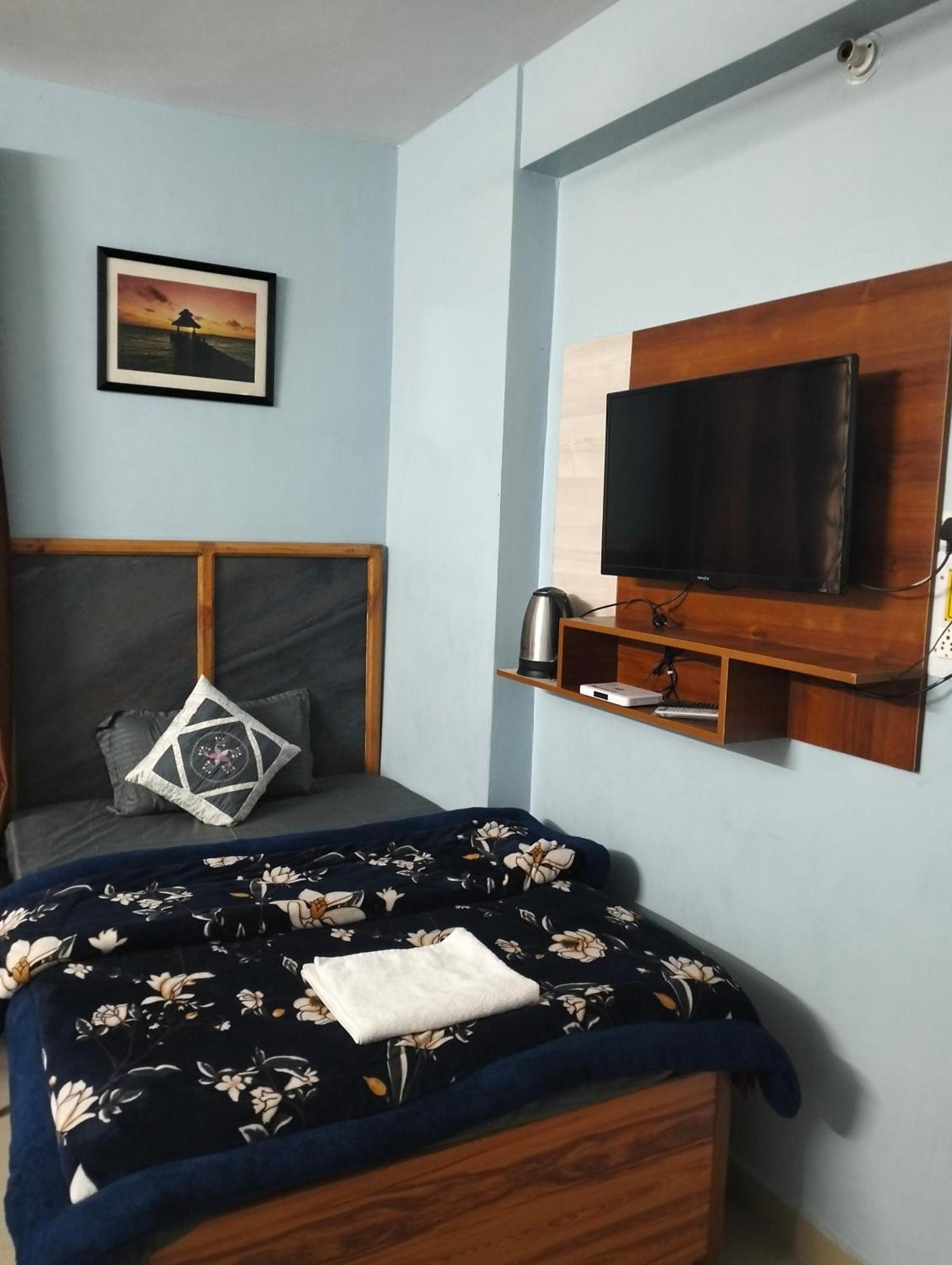 Aman Inn Dharamshala Phòng bức ảnh